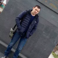 Николай